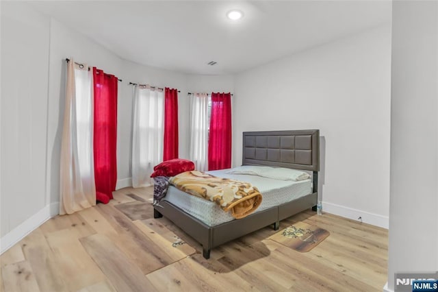 bedroom featuring light hardwood / wood-style floors