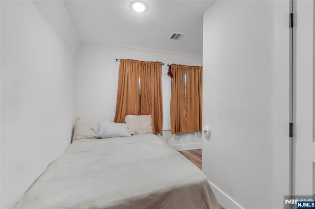 bedroom featuring light hardwood / wood-style floors