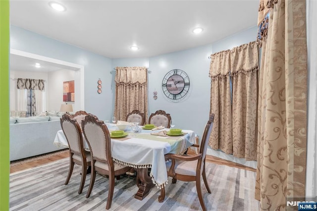 dining space featuring light hardwood / wood-style flooring