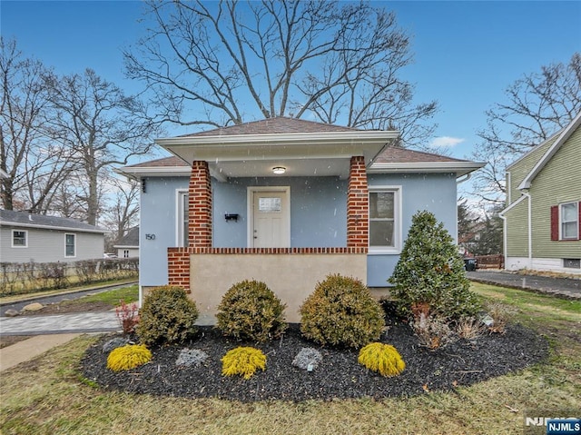 bungalow-style house with a porch