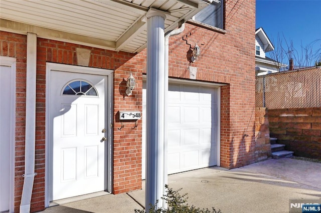 entrance to property with a garage