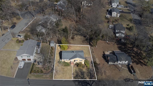 birds eye view of property featuring a residential view