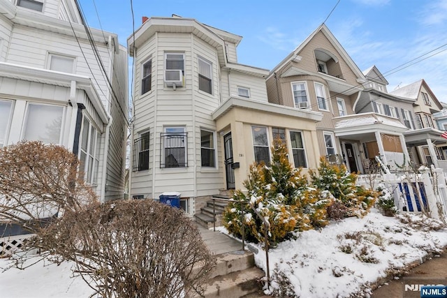 view of front of home with cooling unit