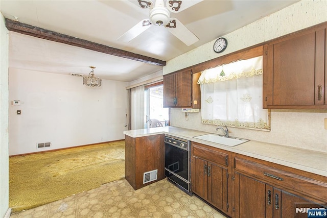 kitchen featuring sink, ceiling fan, backsplash, beam ceiling, and black dishwasher