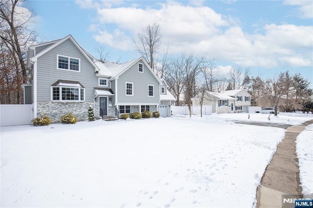 view of snow covered house