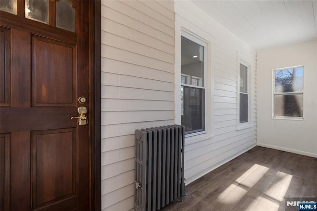 doorway to property with radiator