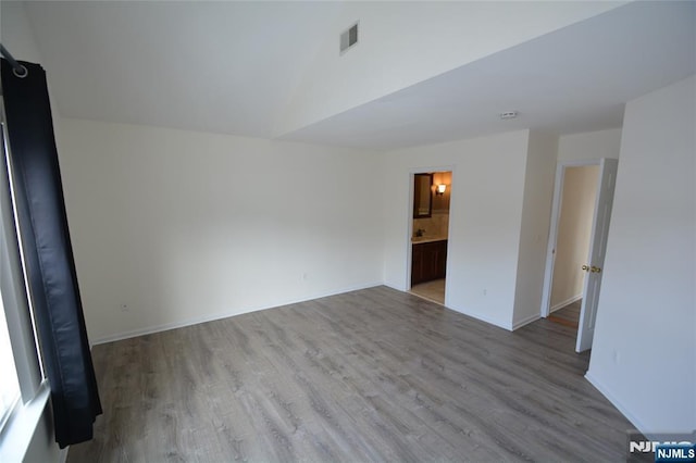 empty room with light wood-type flooring
