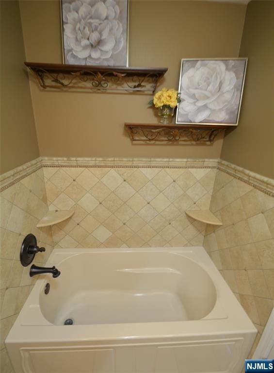 bathroom with a bathing tub
