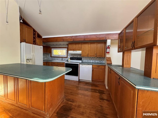 kitchen with white appliances, backsplash, dark hardwood / wood-style flooring, vaulted ceiling, and kitchen peninsula