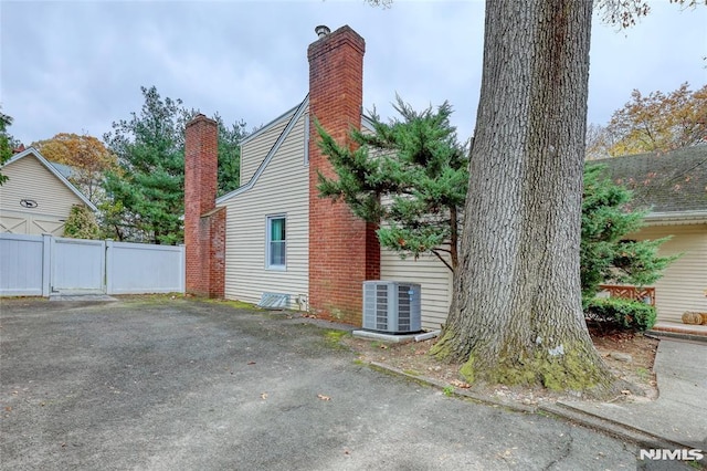 view of side of property featuring cooling unit