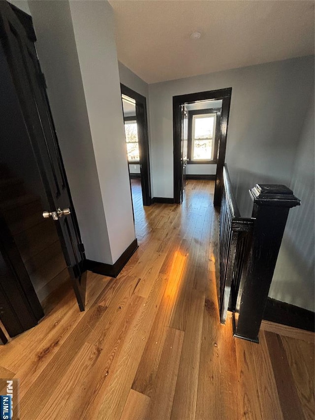 hallway featuring light hardwood / wood-style floors