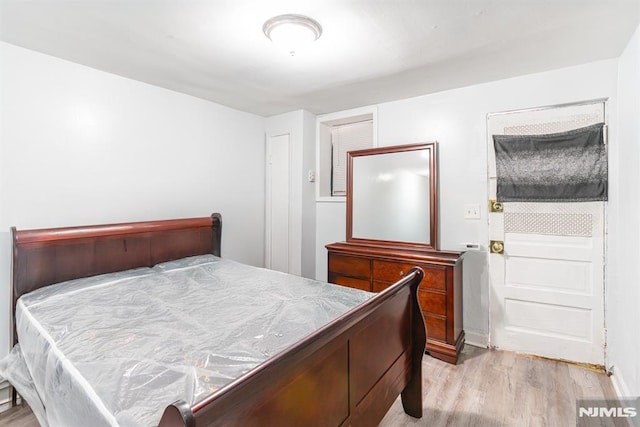 bedroom featuring light hardwood / wood-style floors