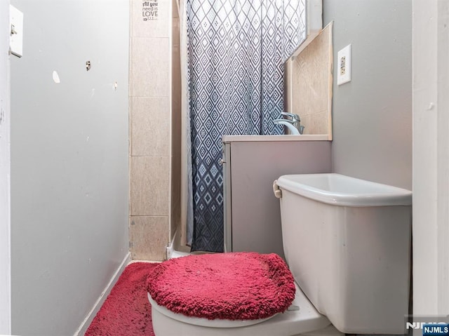 bathroom featuring toilet