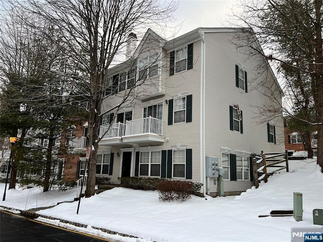 view of snow covered property