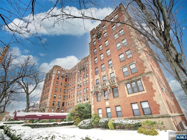 view of snow covered building