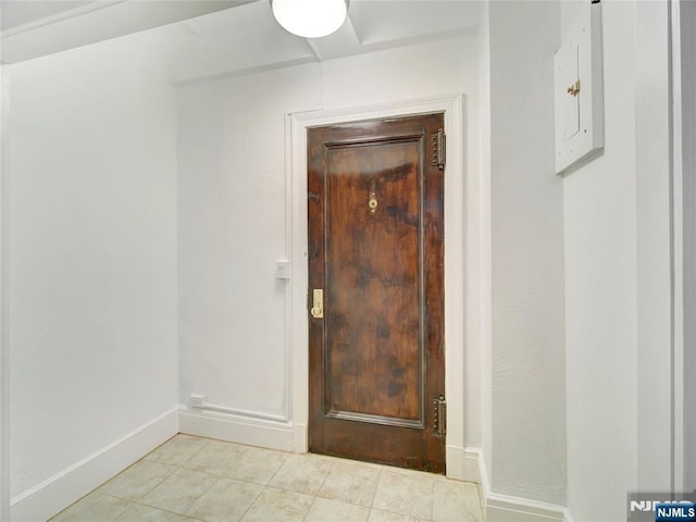 interior space featuring light tile patterned floors