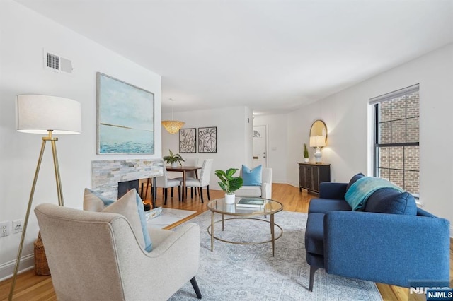 living room with light hardwood / wood-style floors