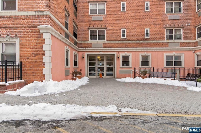 view of snow covered building