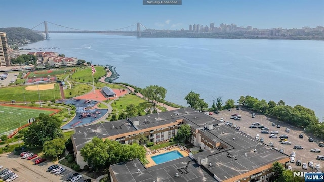 drone / aerial view featuring a water view