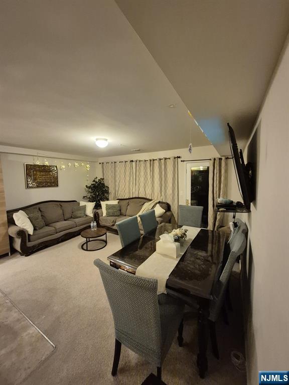 dining room with carpet flooring