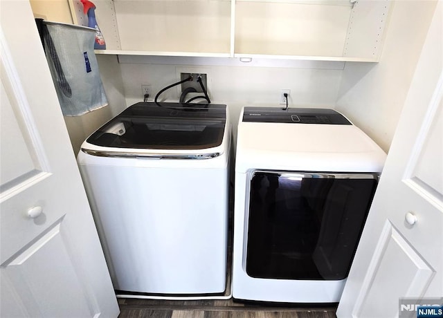 laundry room featuring separate washer and dryer