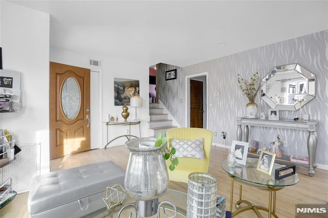 living room with light hardwood / wood-style floors