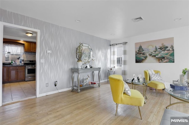 living area featuring light wood-type flooring