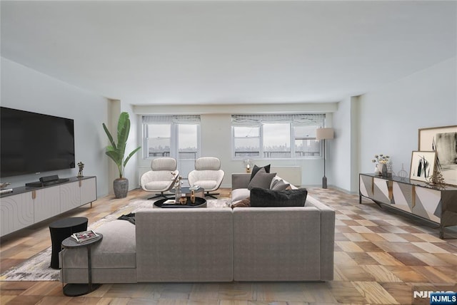 living room featuring light parquet floors