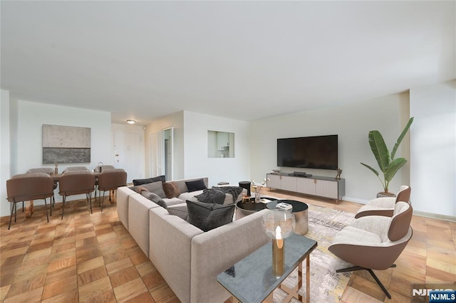 living room with light parquet floors