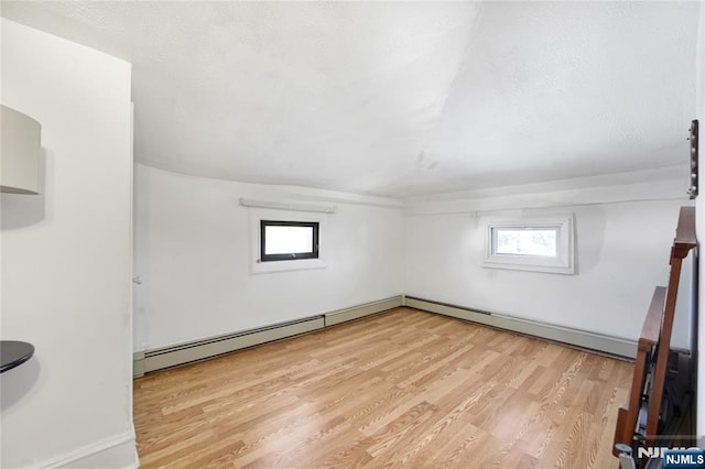 spare room featuring light hardwood / wood-style floors