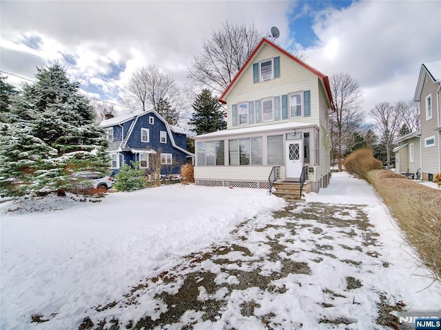 view of snow covered property