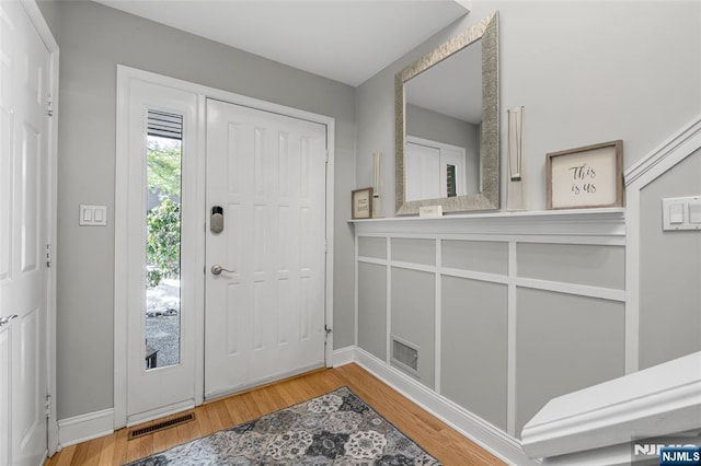 entryway featuring wood-type flooring