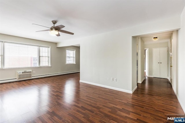 unfurnished room with ceiling fan and dark hardwood / wood-style floors