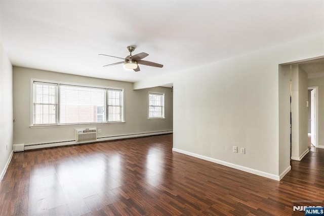 unfurnished room with dark hardwood / wood-style flooring, ceiling fan, and baseboard heating