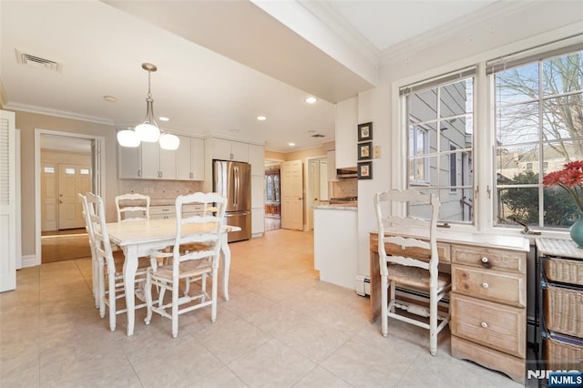 dining space featuring visible vents, recessed lighting, and ornamental molding