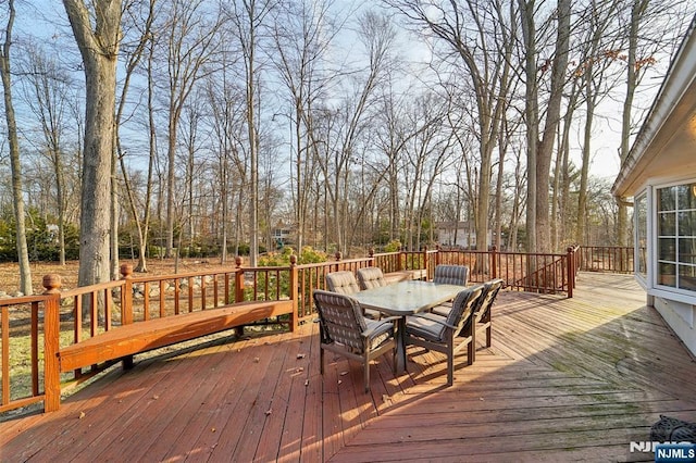 deck featuring outdoor dining space