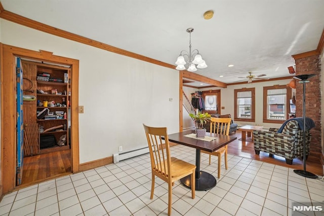 dining space with baseboards, ornamental molding, light tile patterned floors, baseboard heating, and ceiling fan with notable chandelier