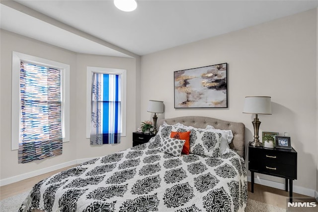 bedroom featuring hardwood / wood-style flooring