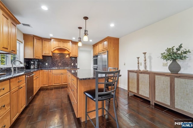 kitchen with stainless steel appliances, visible vents, backsplash, custom exhaust hood, and dark stone counters