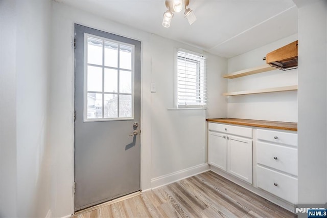 doorway featuring light wood-type flooring