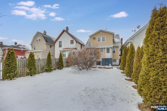 view of snow covered house