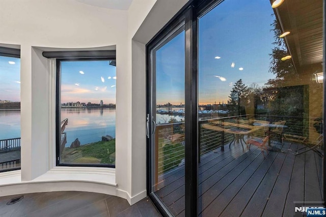 entryway featuring a water view