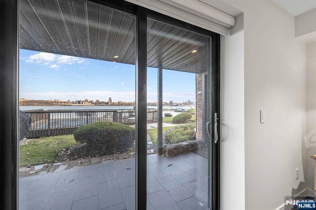 doorway featuring a water view