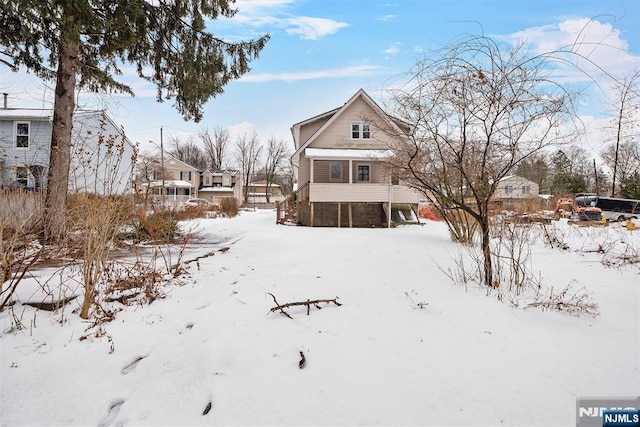 view of snow covered property