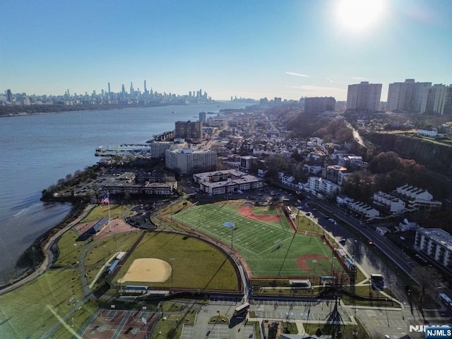 birds eye view of property featuring a water view