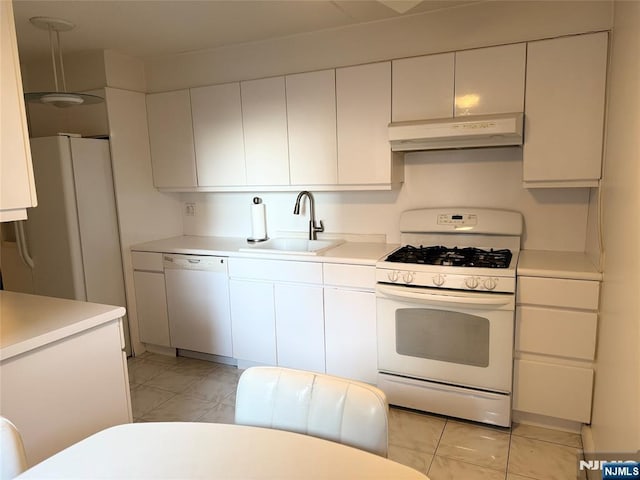 kitchen with white cabinetry, sink, white appliances, and decorative light fixtures