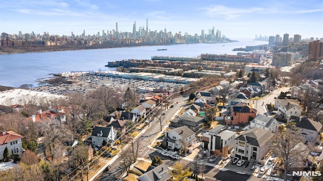 aerial view with a water view and a city view