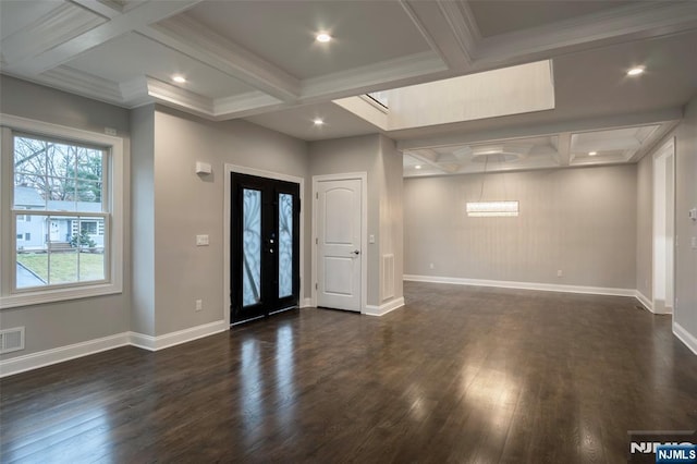 entryway with dark wood-type flooring, coffered ceiling, and beamed ceiling