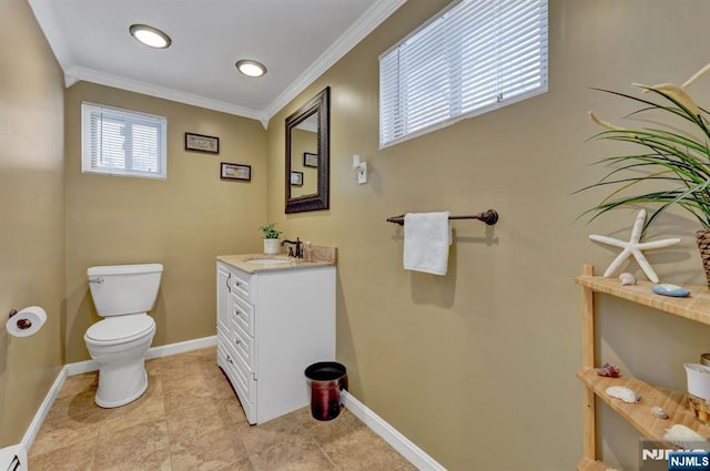 bathroom featuring vanity, a baseboard heating unit, crown molding, and toilet