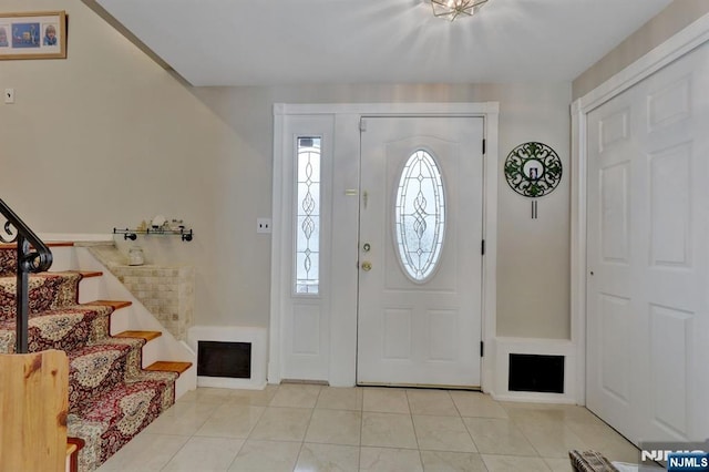 view of tiled foyer entrance